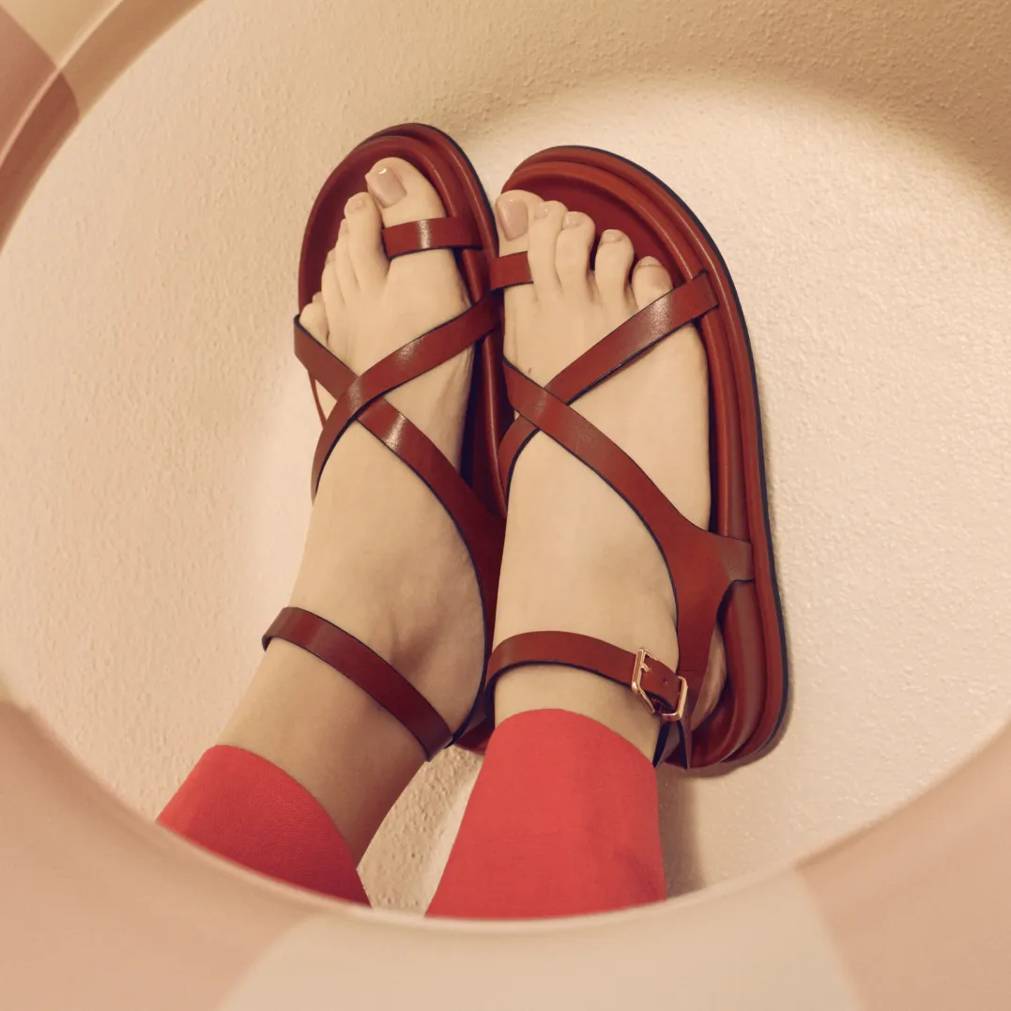 Shop our collection of toe-loop sandals.