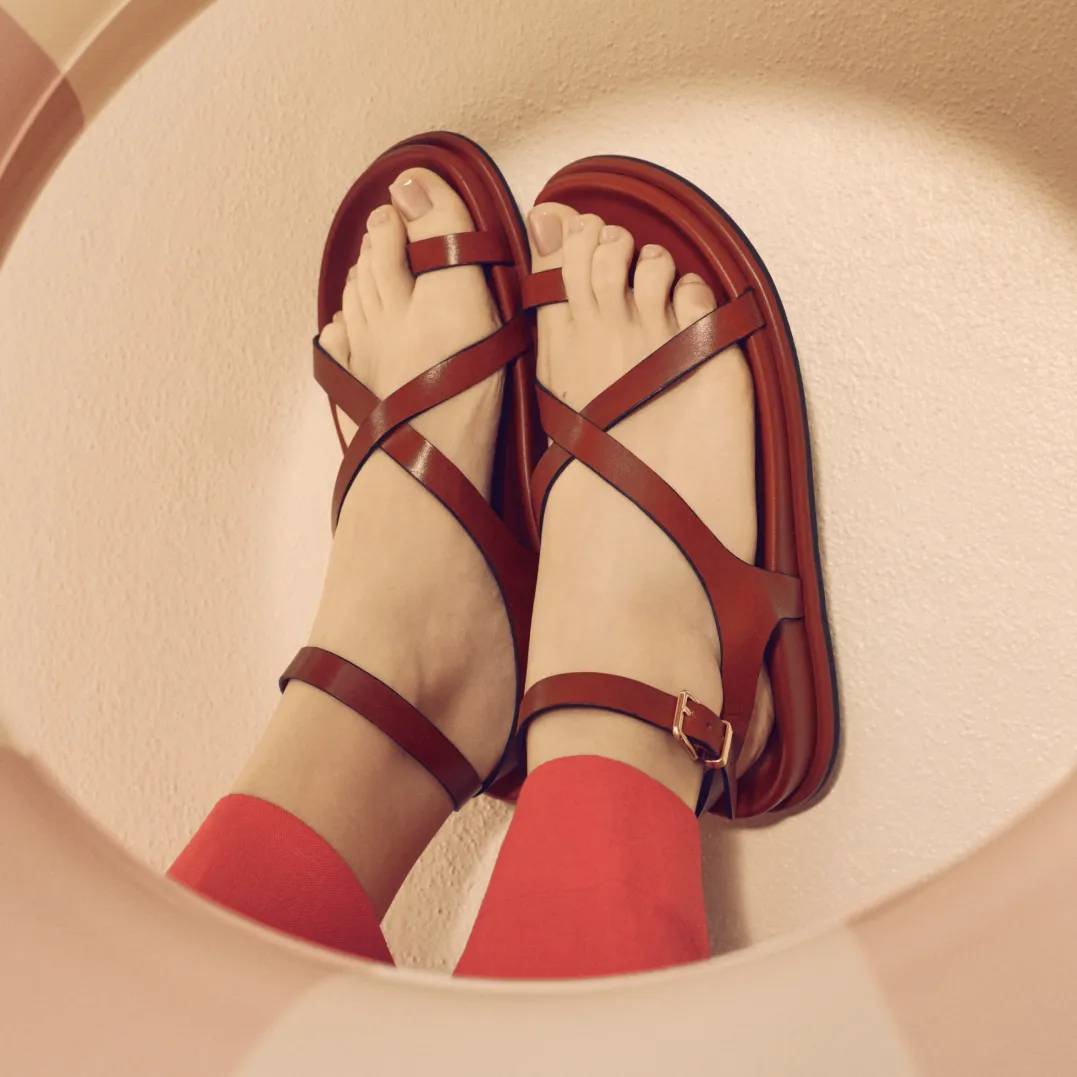 Shop our collection of toe-loop sandals.