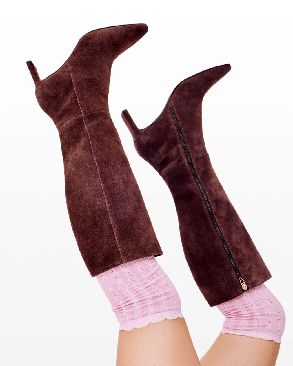 Featuring a model in tall, suede burgundy boots