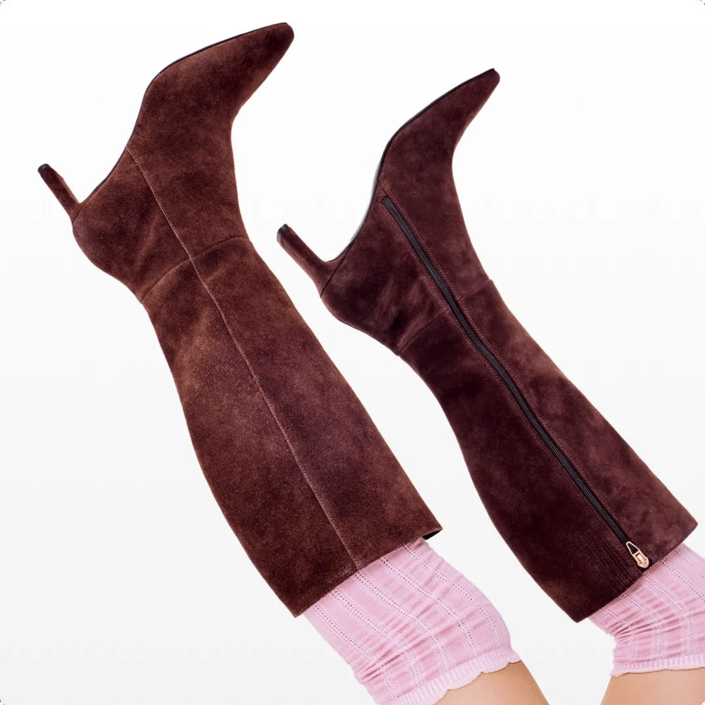 Featuring a pair of tall suede boots.