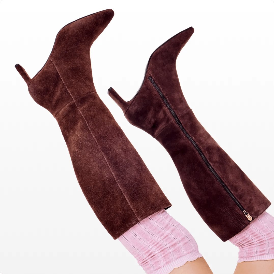Featuring a pair of tall suede boots.