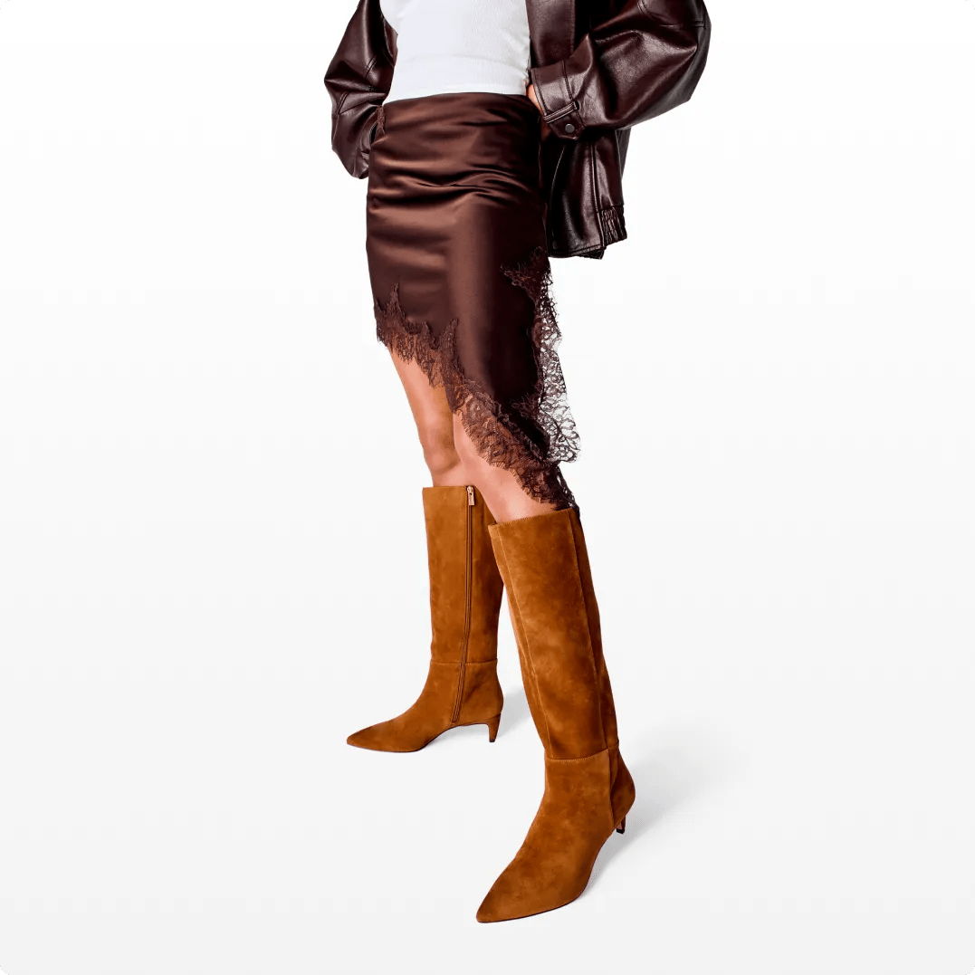 Featuring a model in tall brown suede boots