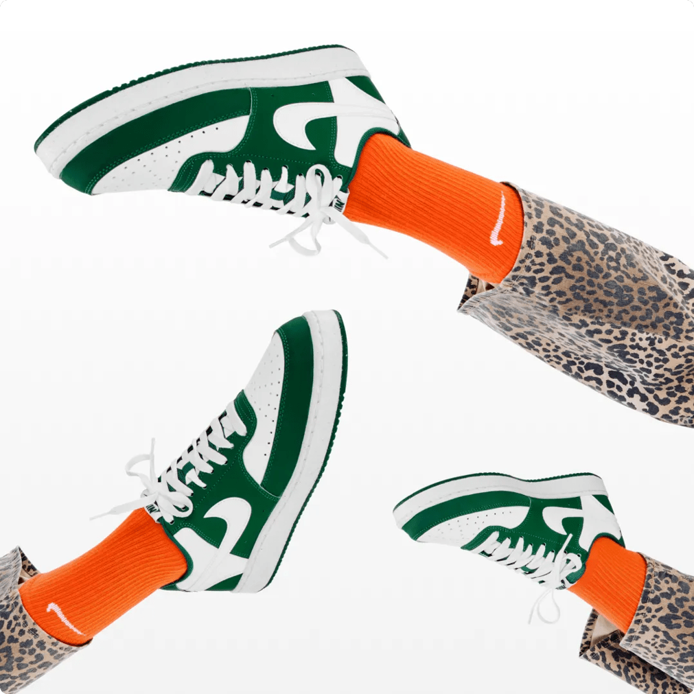 Featuring green and white Nike sneakers