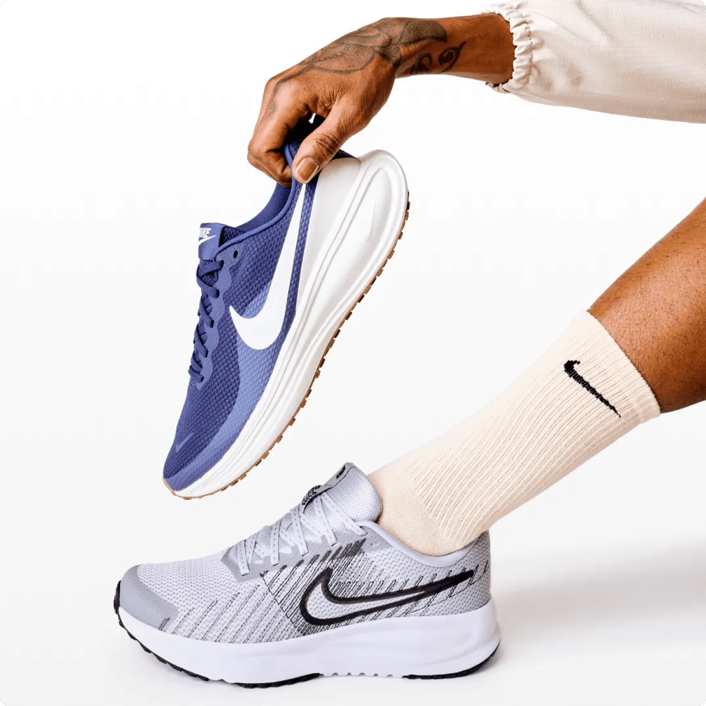 Featuring two pairs of Nike running shoes.