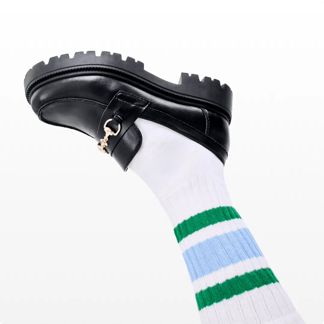 Featuring a black loafer