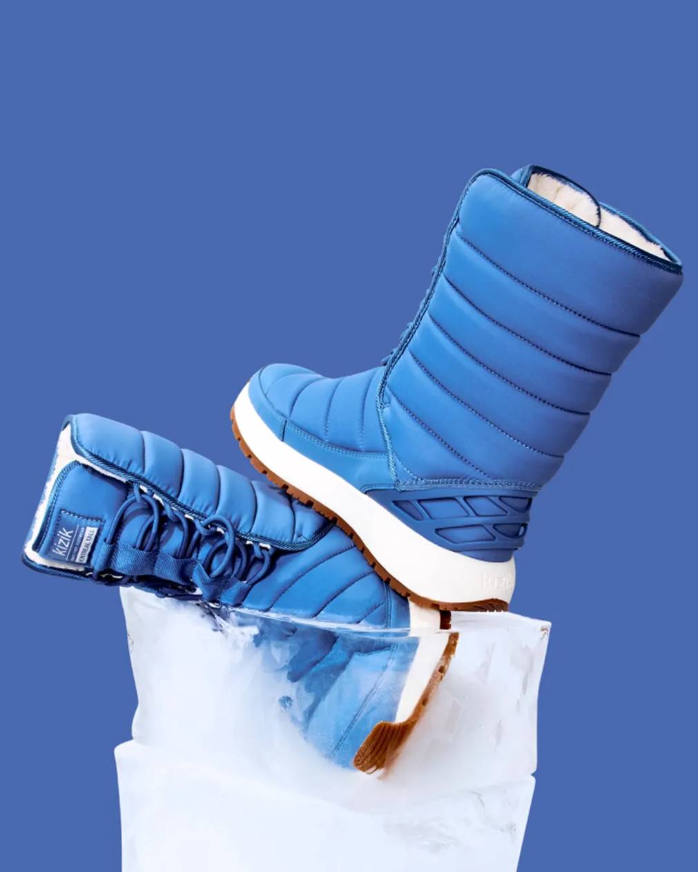 Featuring a model in printed pants and uggs.