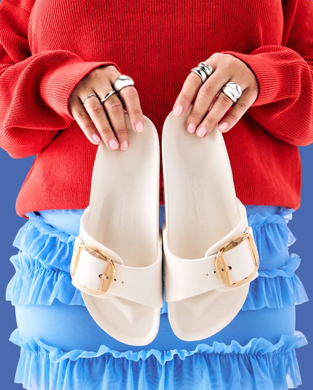 Featuring a model wearing chunky Sorel boots.