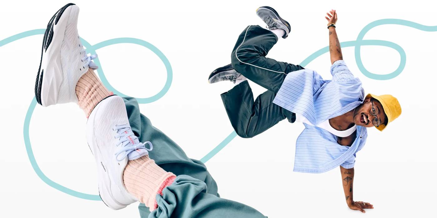 Featuring a model in sneakers.