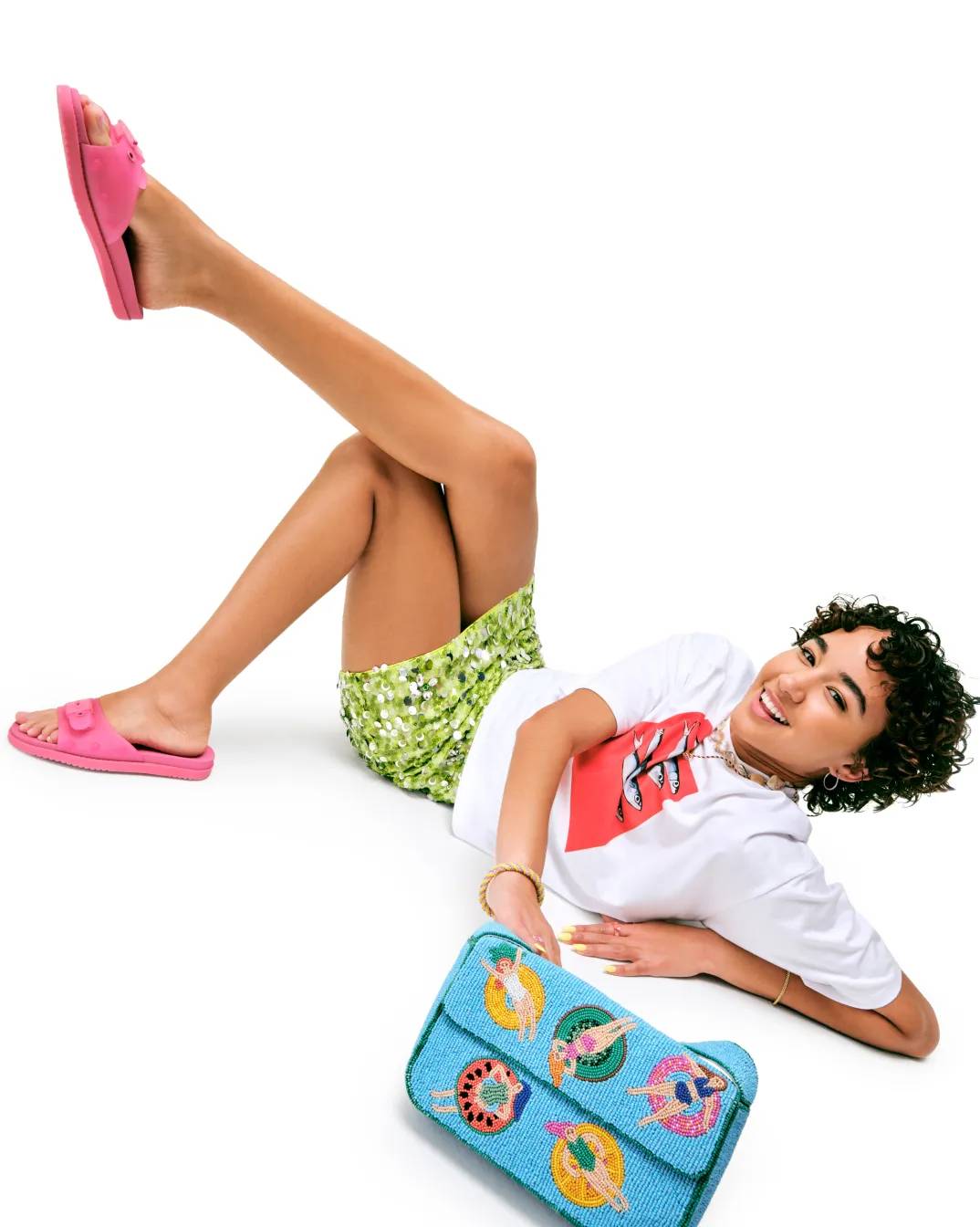 Featuring a model in jelly sandals.