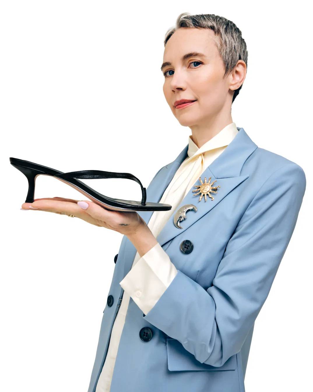 Featuring a model in black kitten heels.