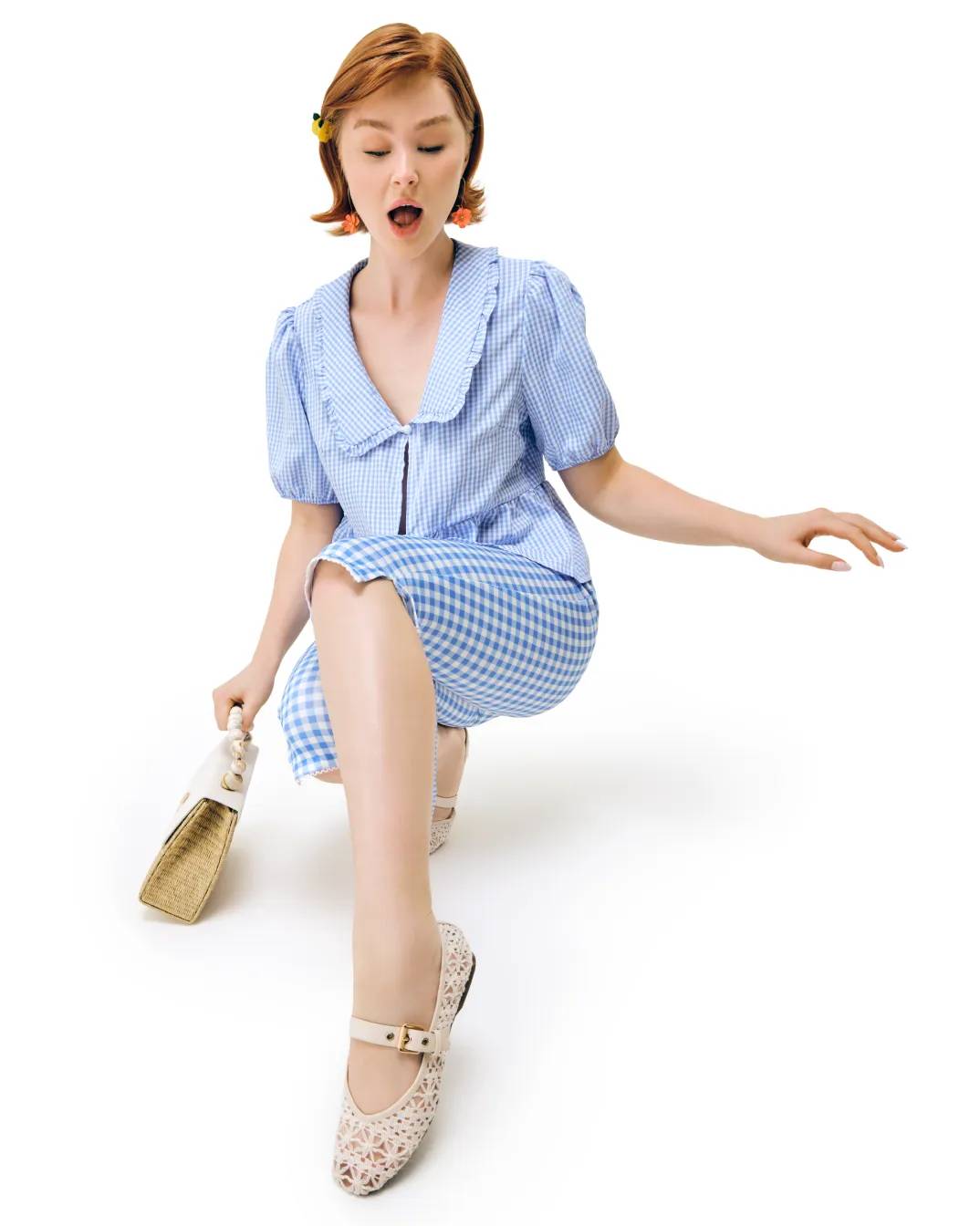 Featuring a model in a dress and flats.