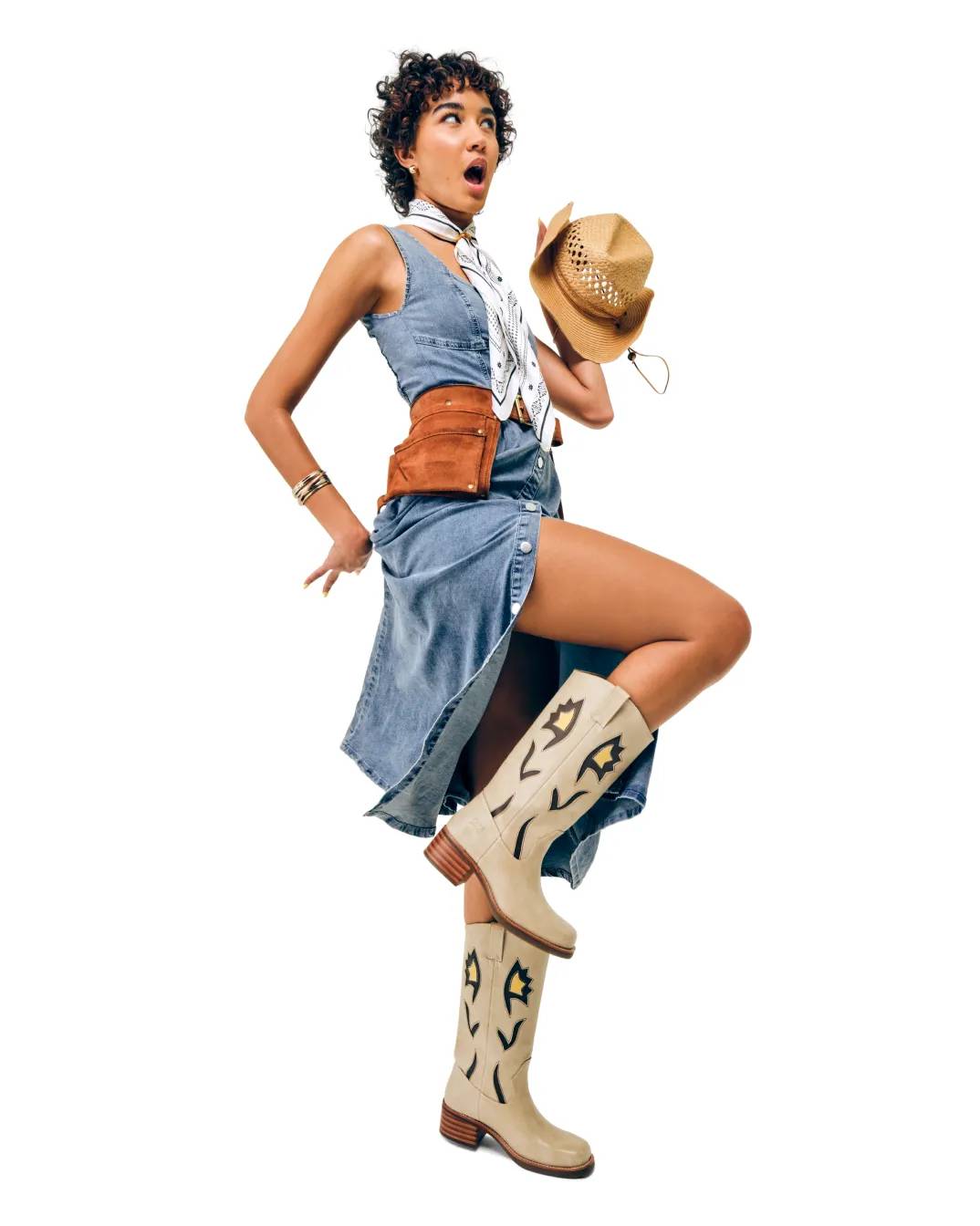 Featuring a model wearing western boots.