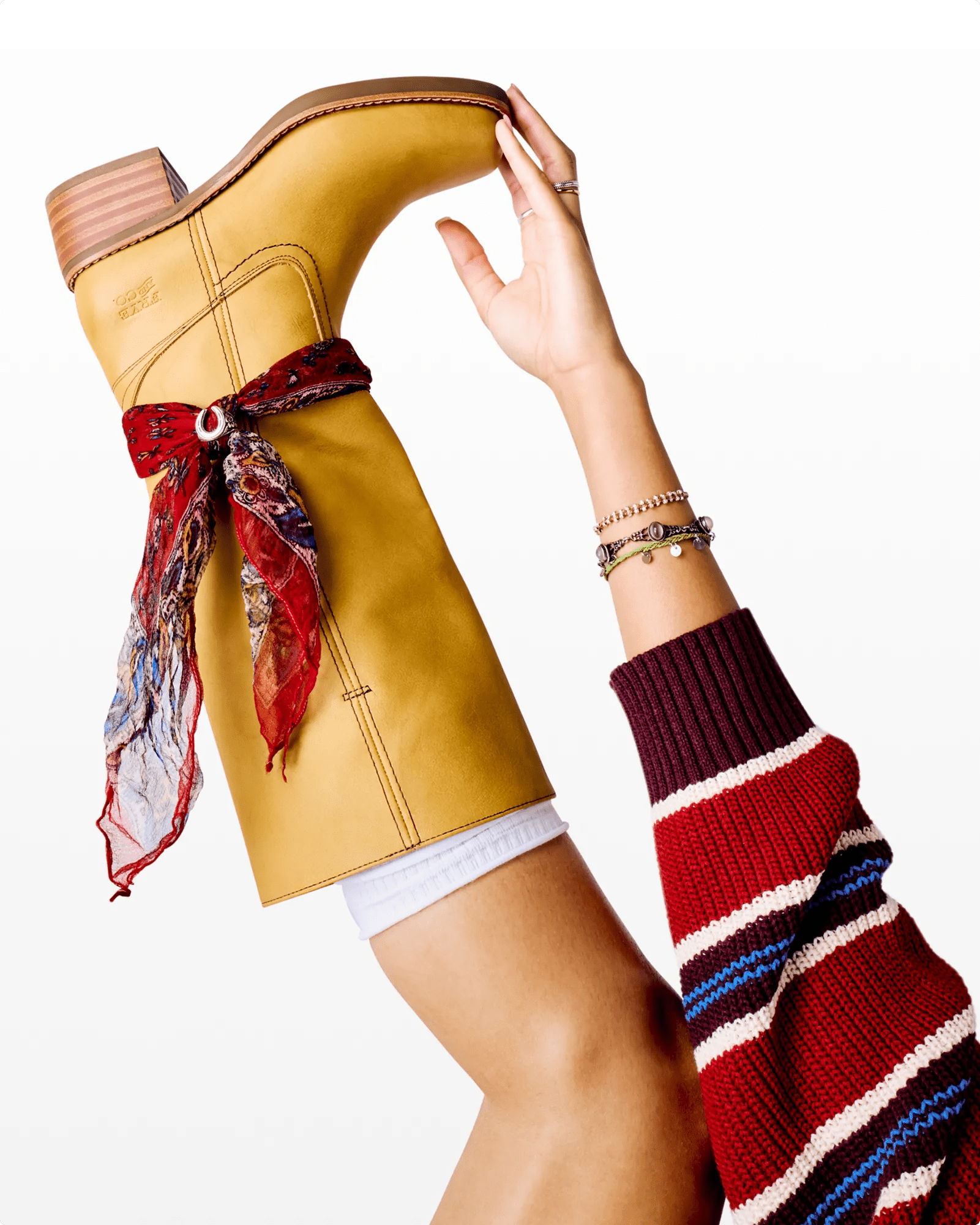 A person wearing the Fry & Co. Miranda Western Boot 600456 .