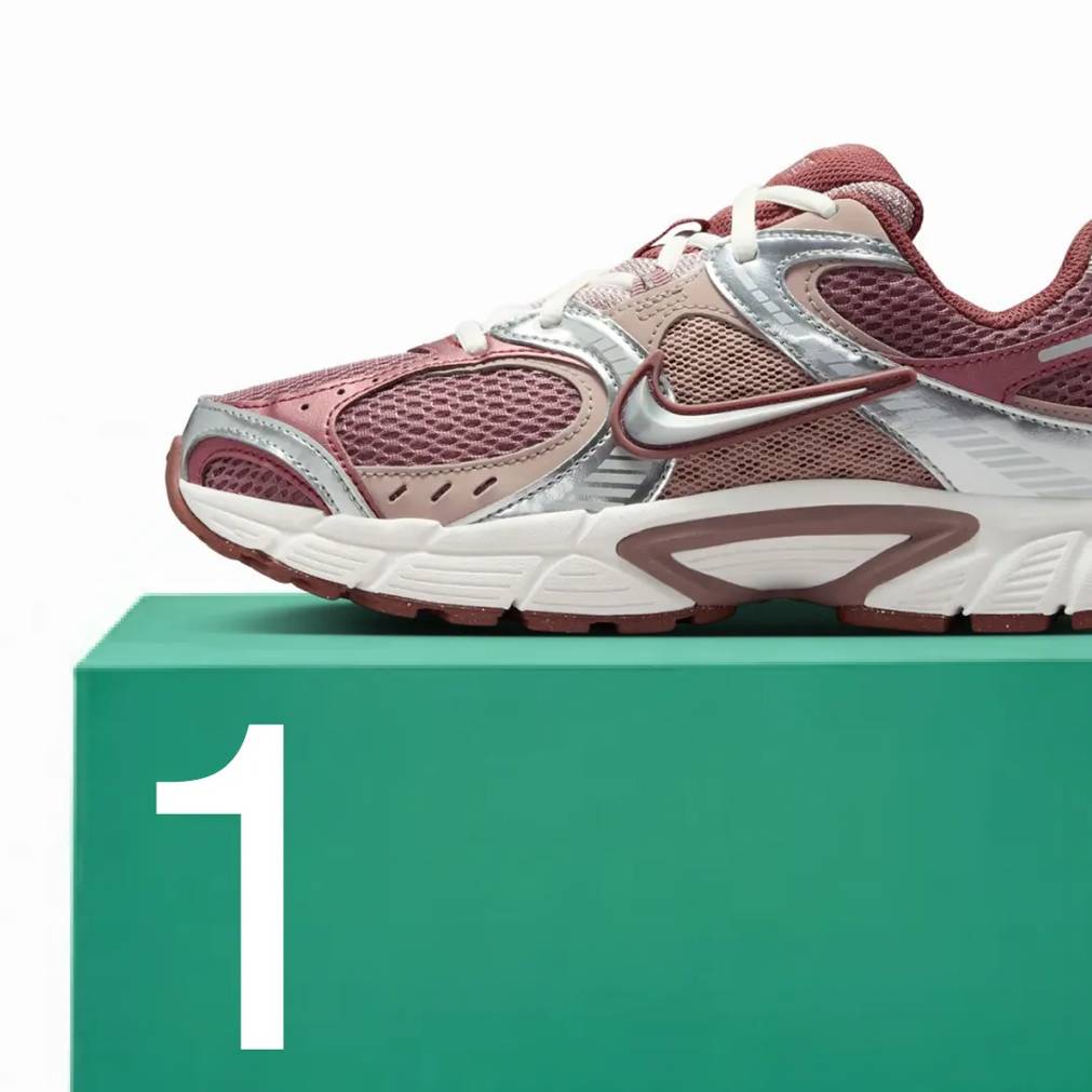 Featuring a women's burgundy Nike V5 RNR sneaker.