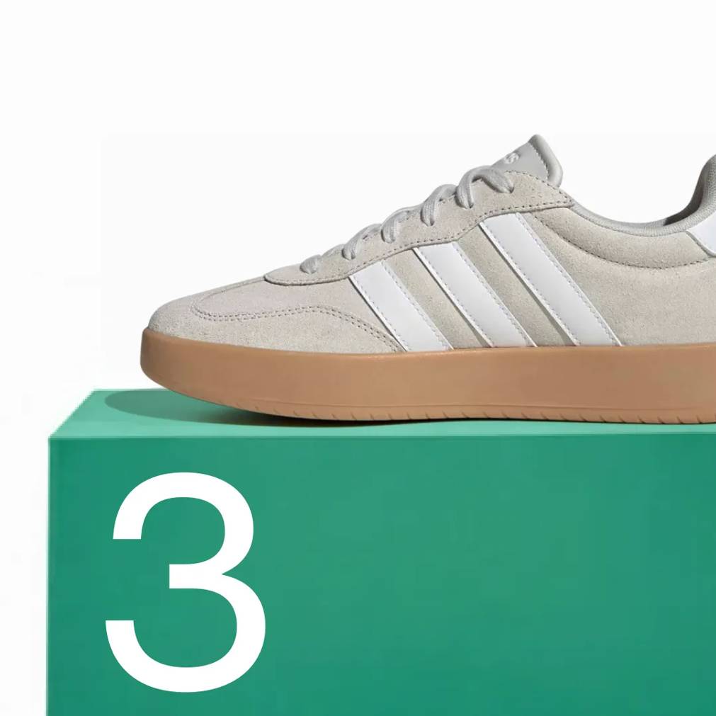 Featuring a men's cream and white adidas Barreda Lo sneaker.