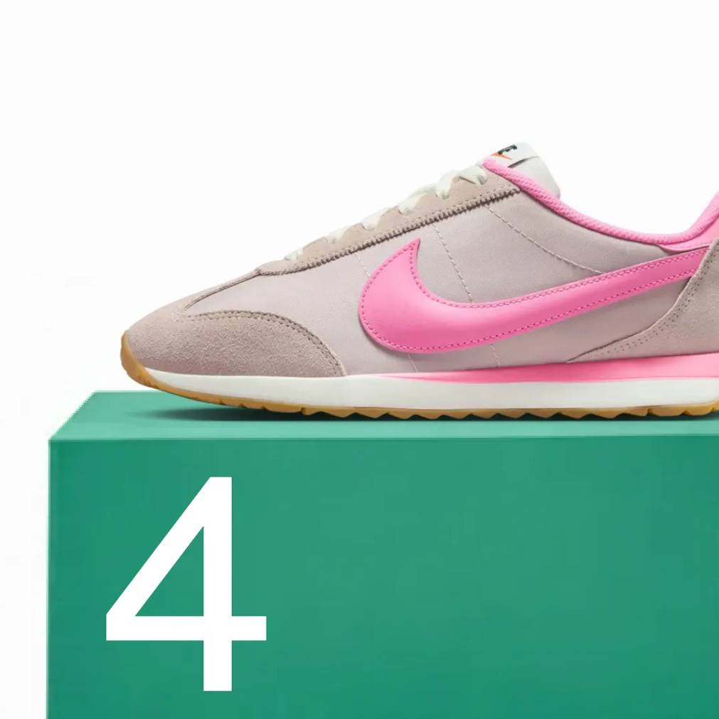 Featuring a women's pink and grey Nike Pacific sneaker.