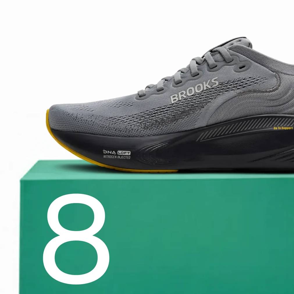 Featuring a men's black and grey Brooks Adrenaline 25 sneaker.