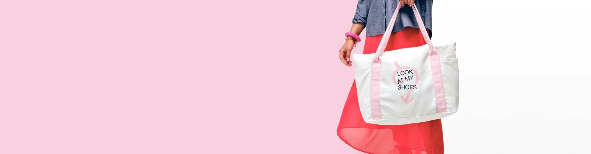 Featuring a pink and white 'Look at my shoes' tote bag.