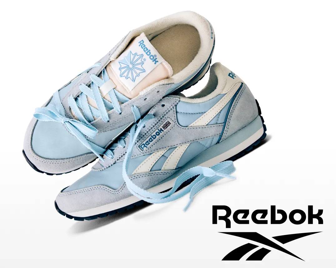 Featuringlight blue Reebok sneakers.