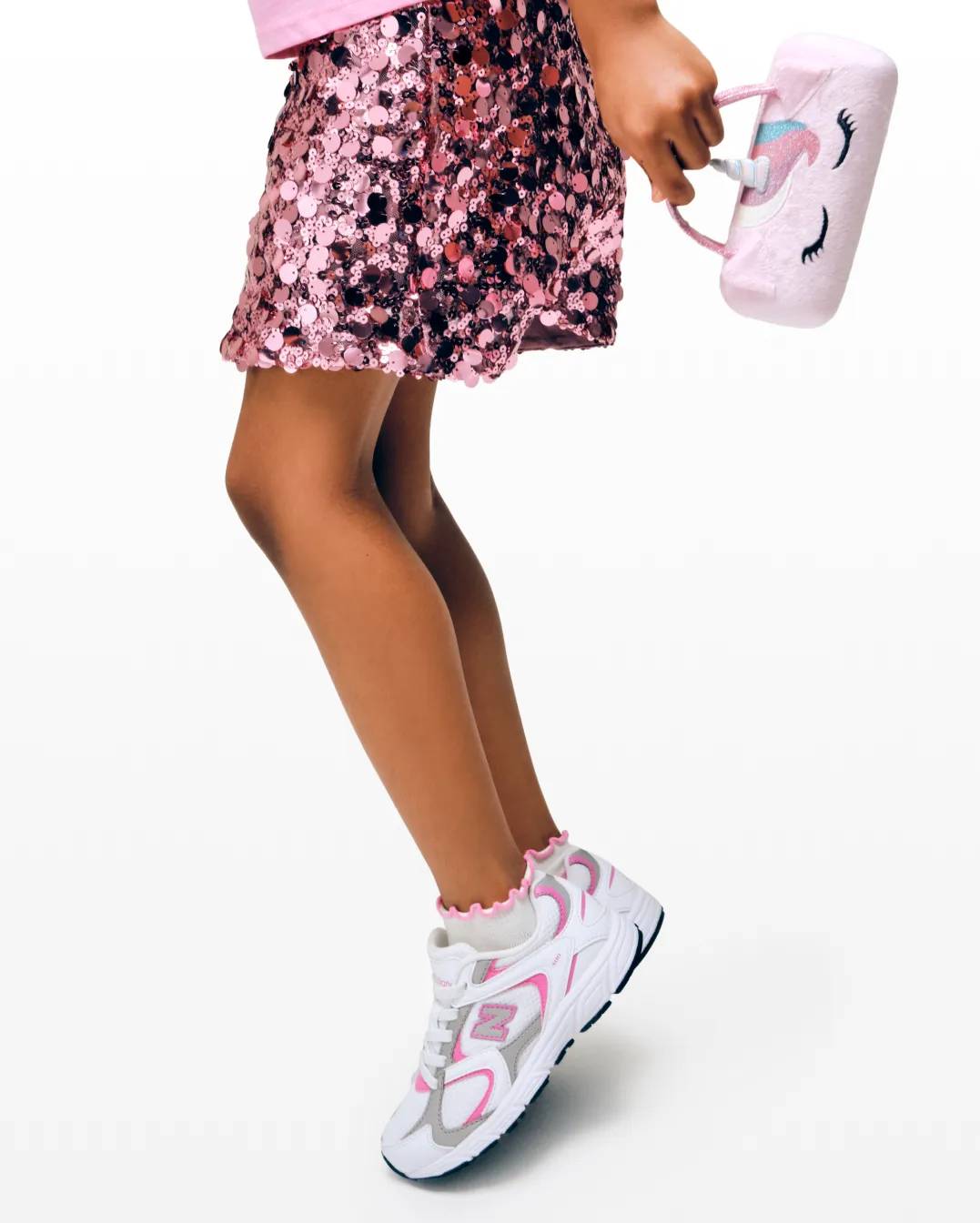 Click to read about How to Wear Sneakers with Dresses