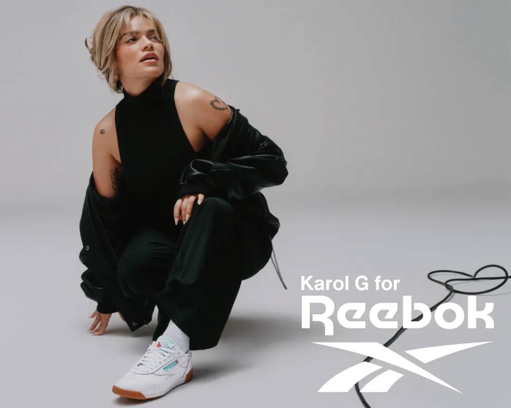 Featuring Karol G wearing Reebok sneakers.