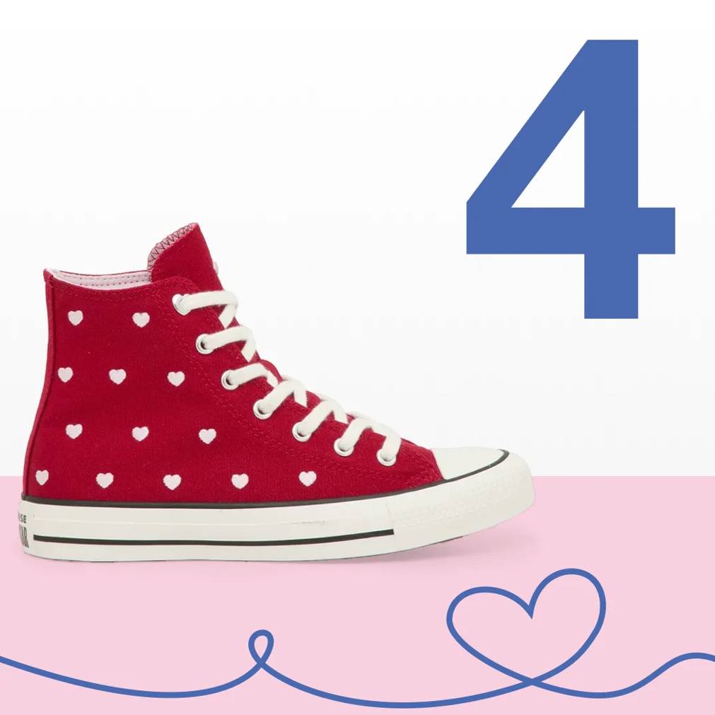 Featuring a women's pink and grey Nike Pacific sneaker.