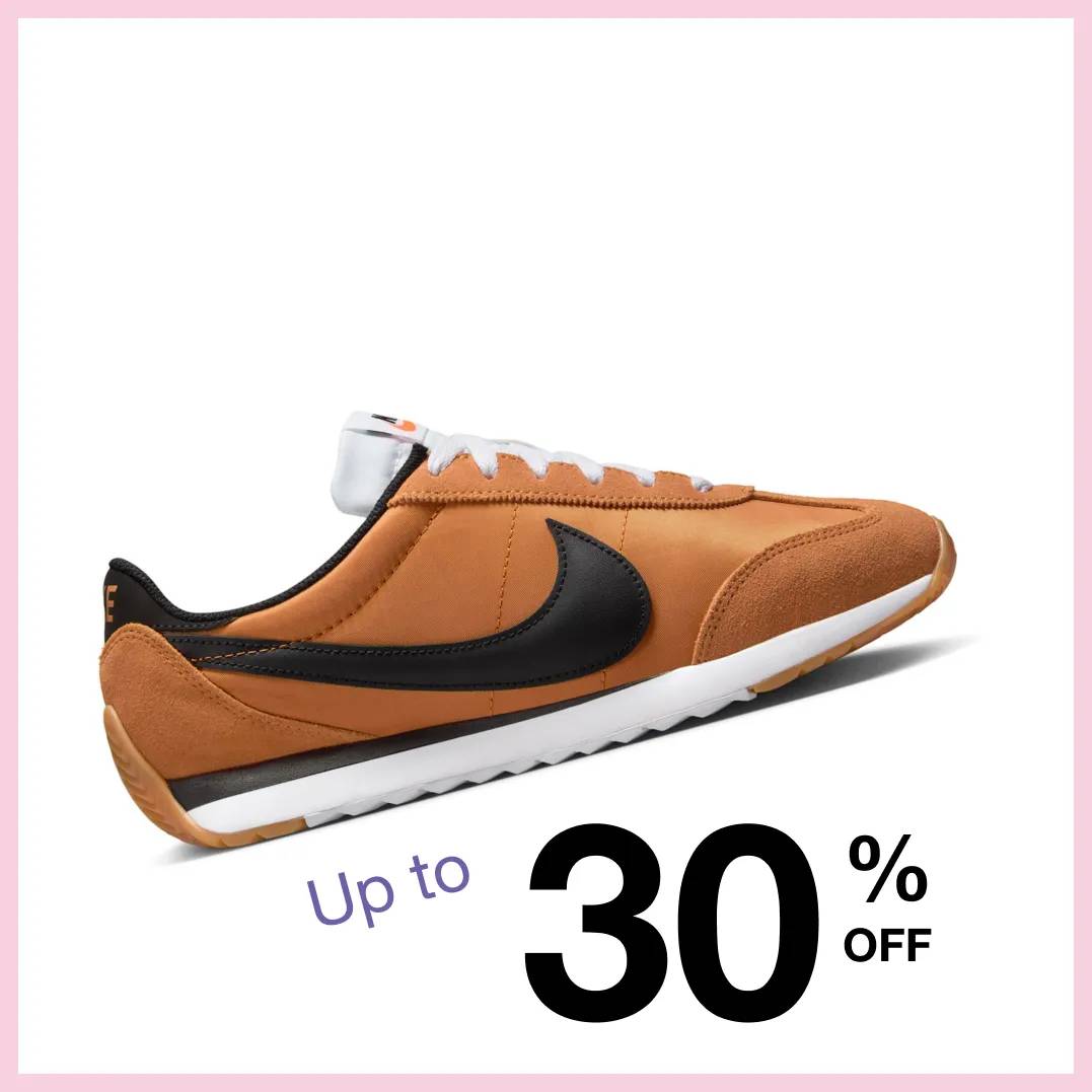 Featuring a women's gold and black sneaker from Nike.