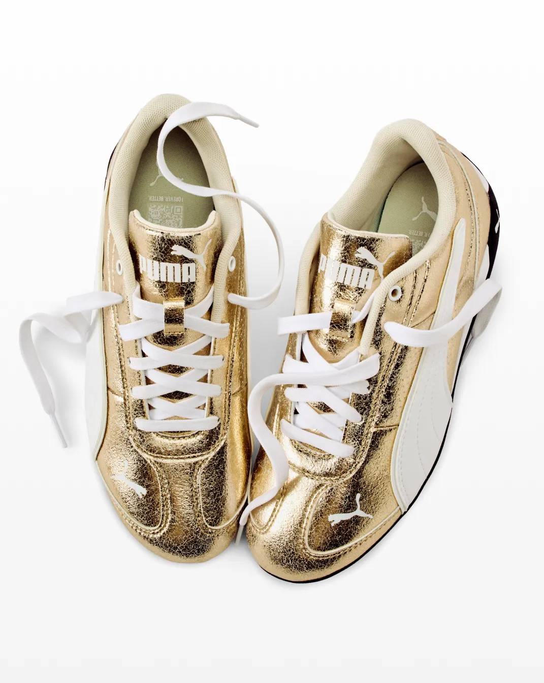 Gold Puma low-profile sneakers