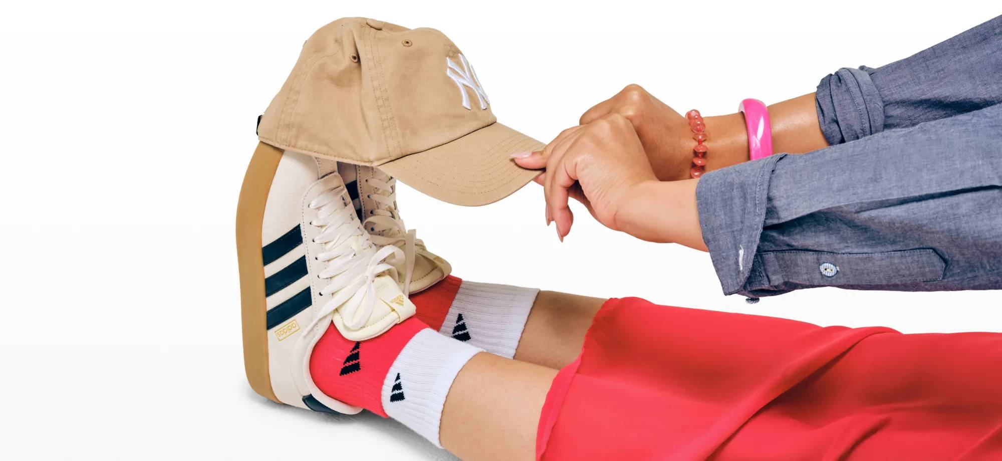 Featuring a model adidas sneakers & showcasing a '47 baseball hat.