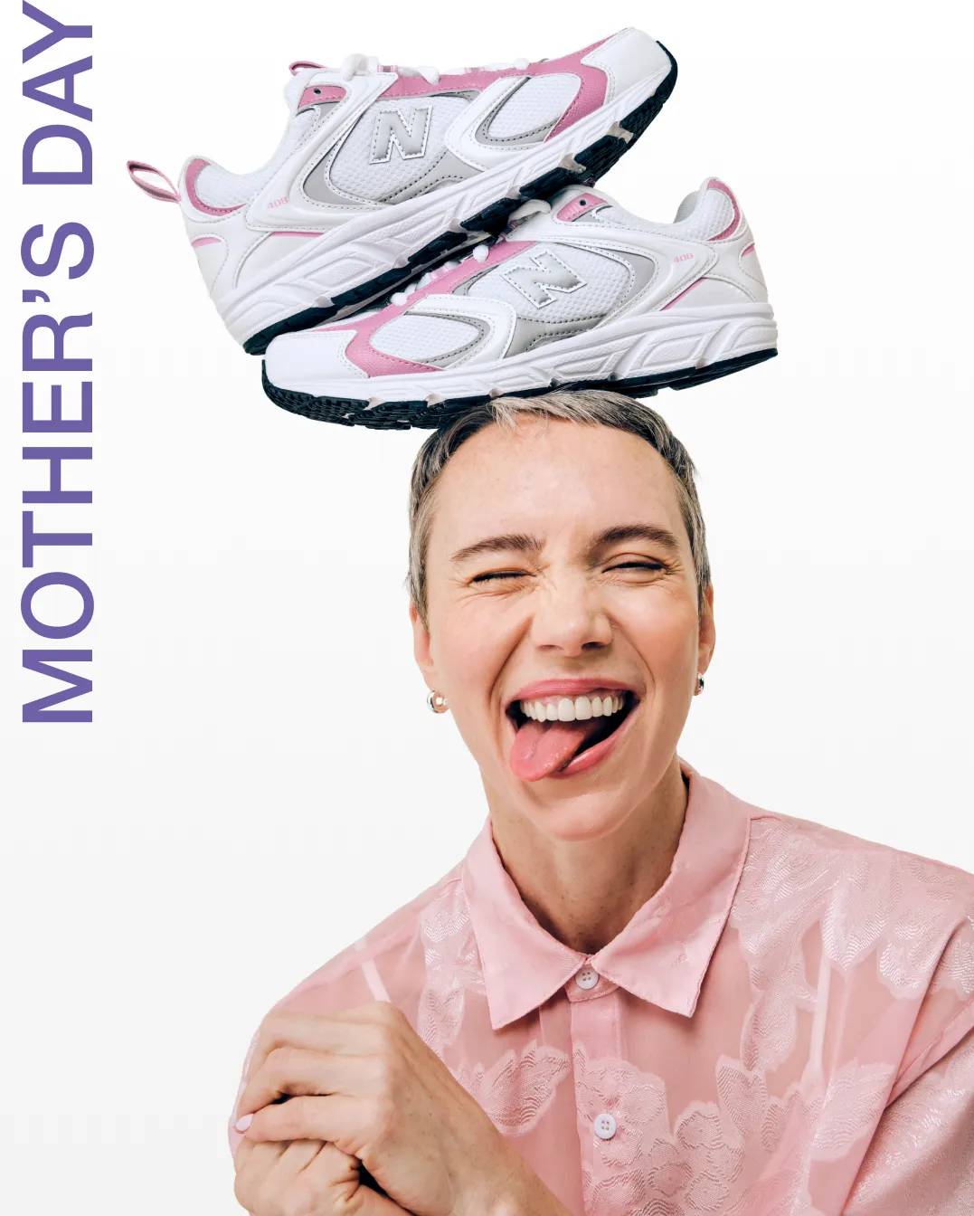 Featuring a woman with pink and grey New Balance sneakers balanced on her head.