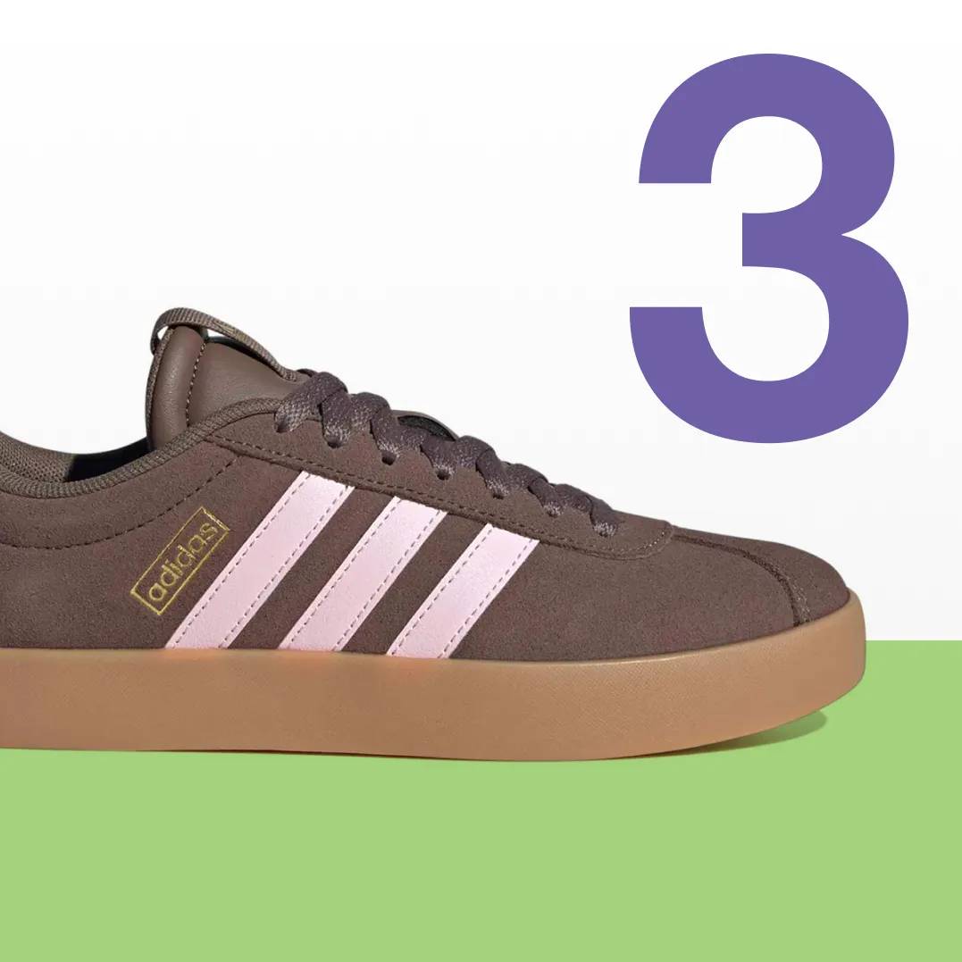 Featuring a brown and pink Adidas court sneaker.