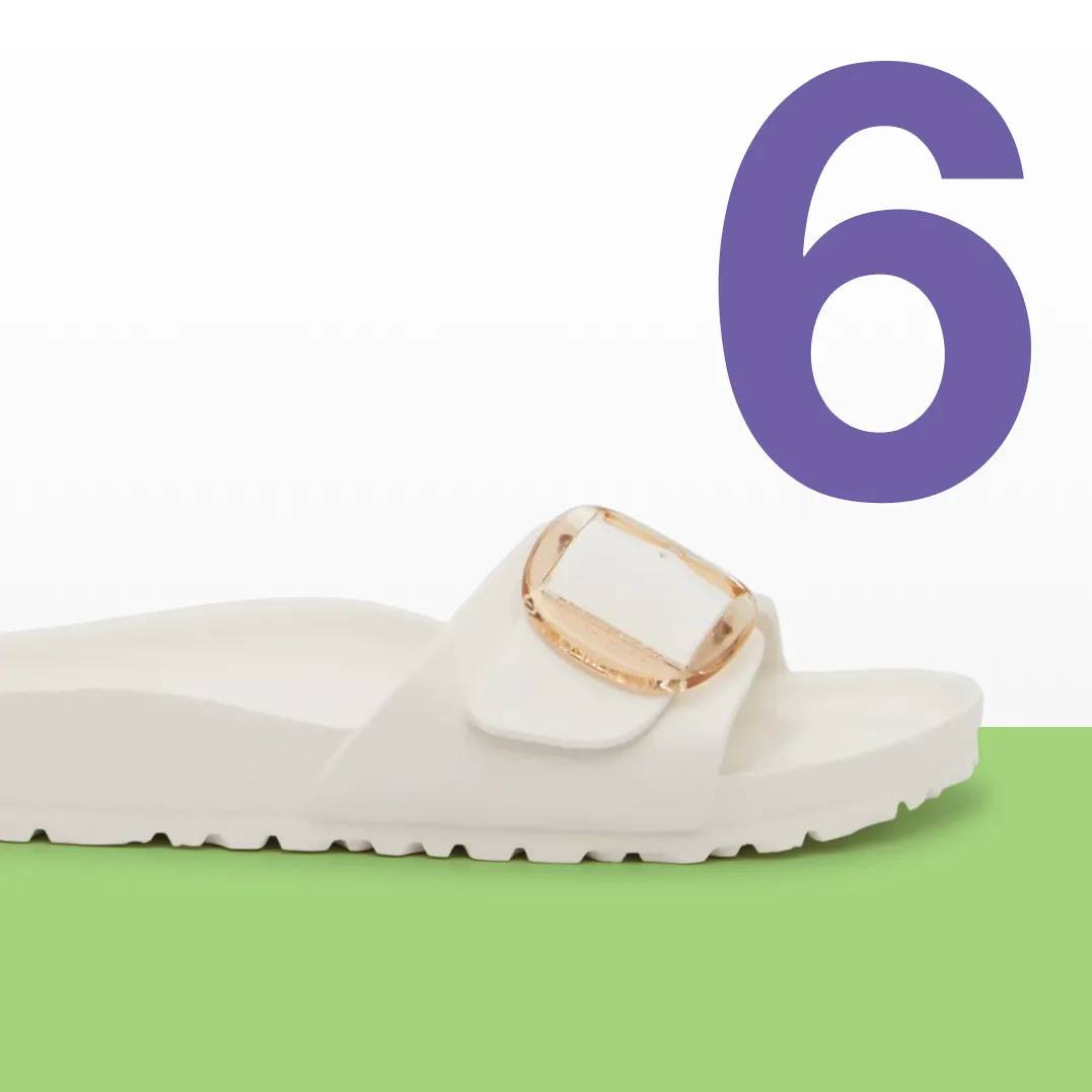 Featuring a white Birkenstock sandal.