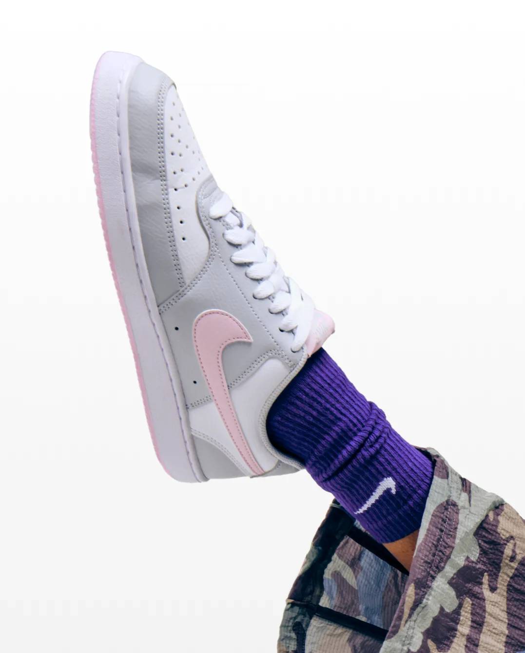 Featuring Nike court sneakers for concerts.