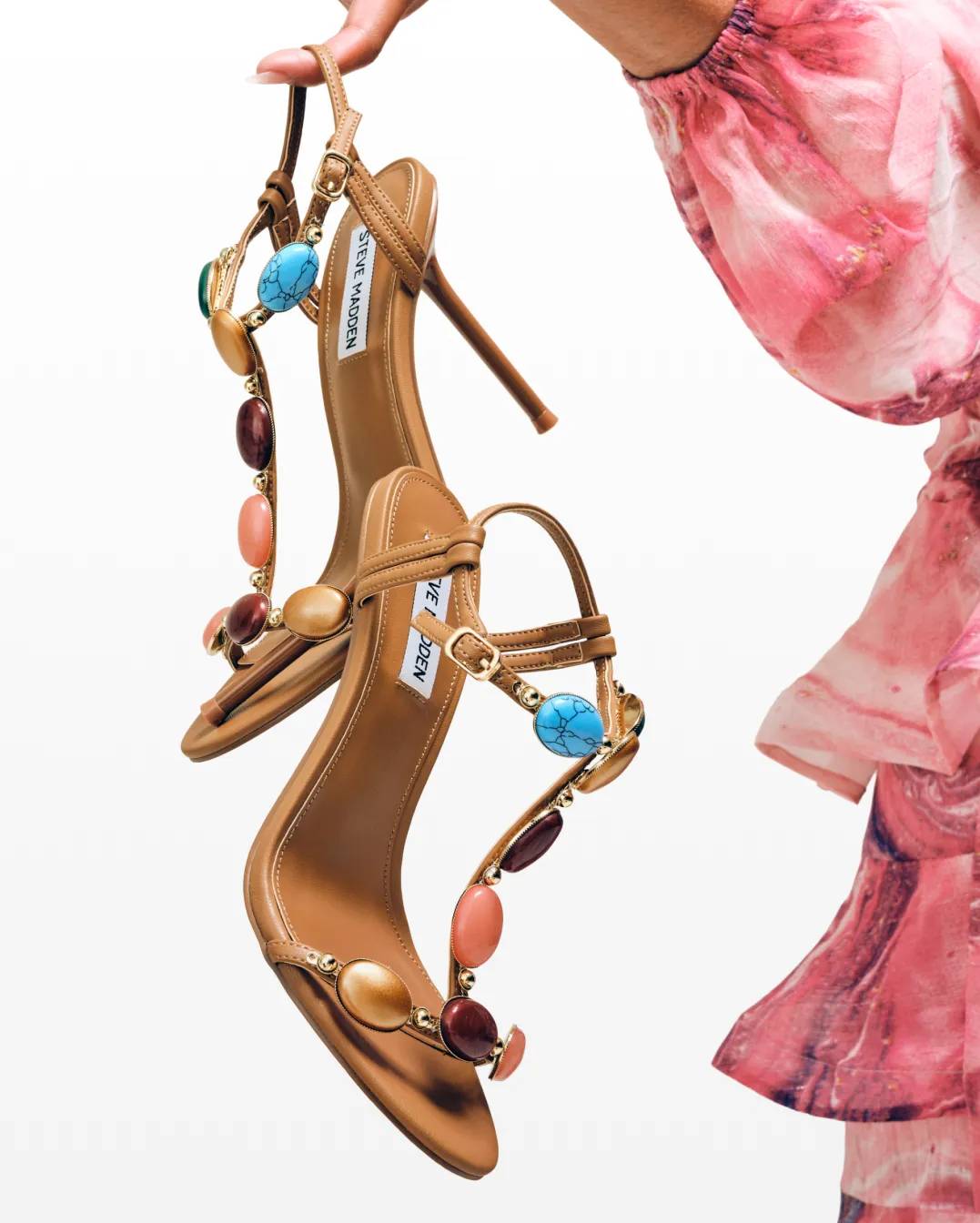 Featuring heeled sandals with hardware details.