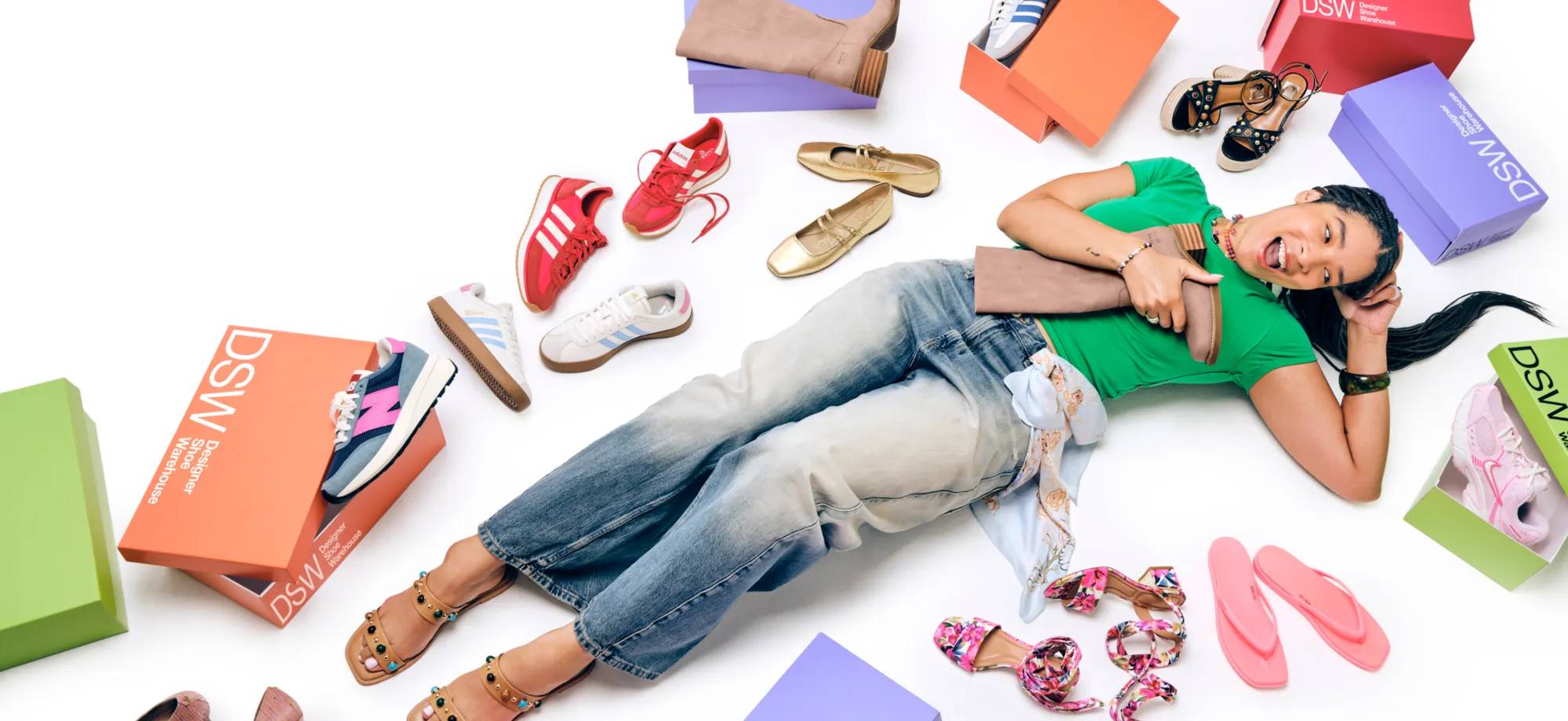 Featuring a model surrounded by all of DSW's top spring shoes for 2026.