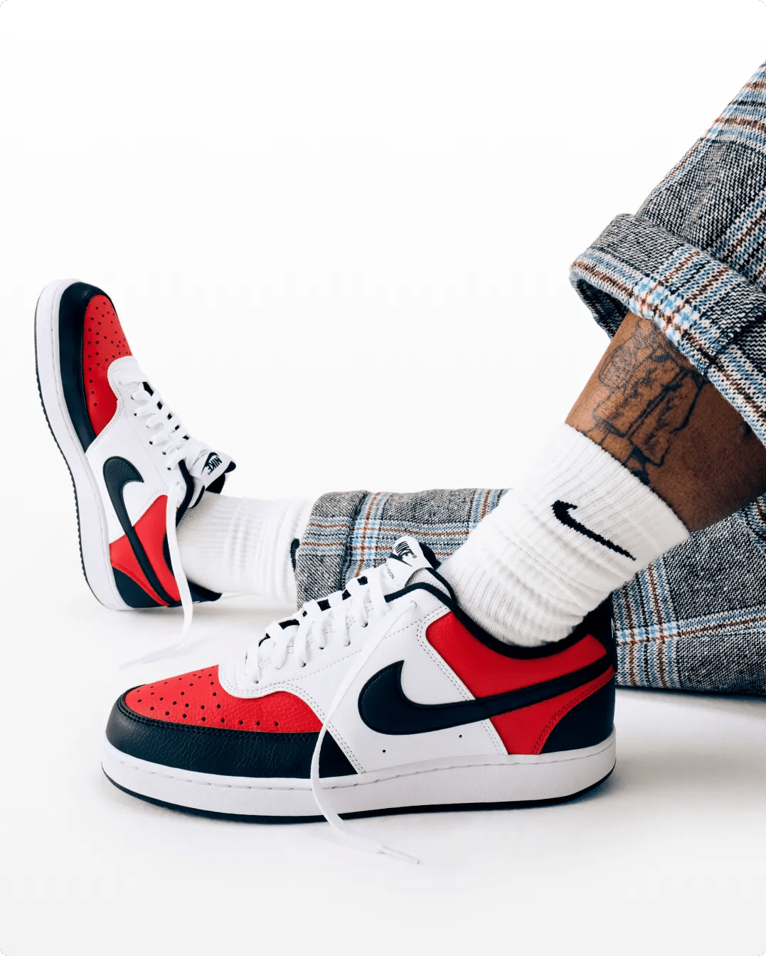 Featuring a model wearing nike court sneakers.