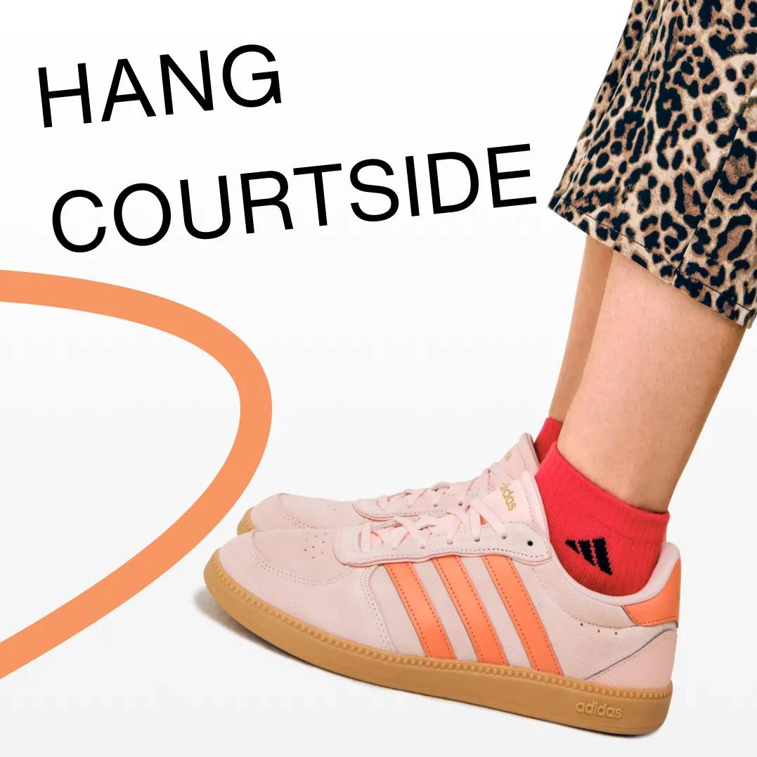 Featuring an orange adidas court sneaker.