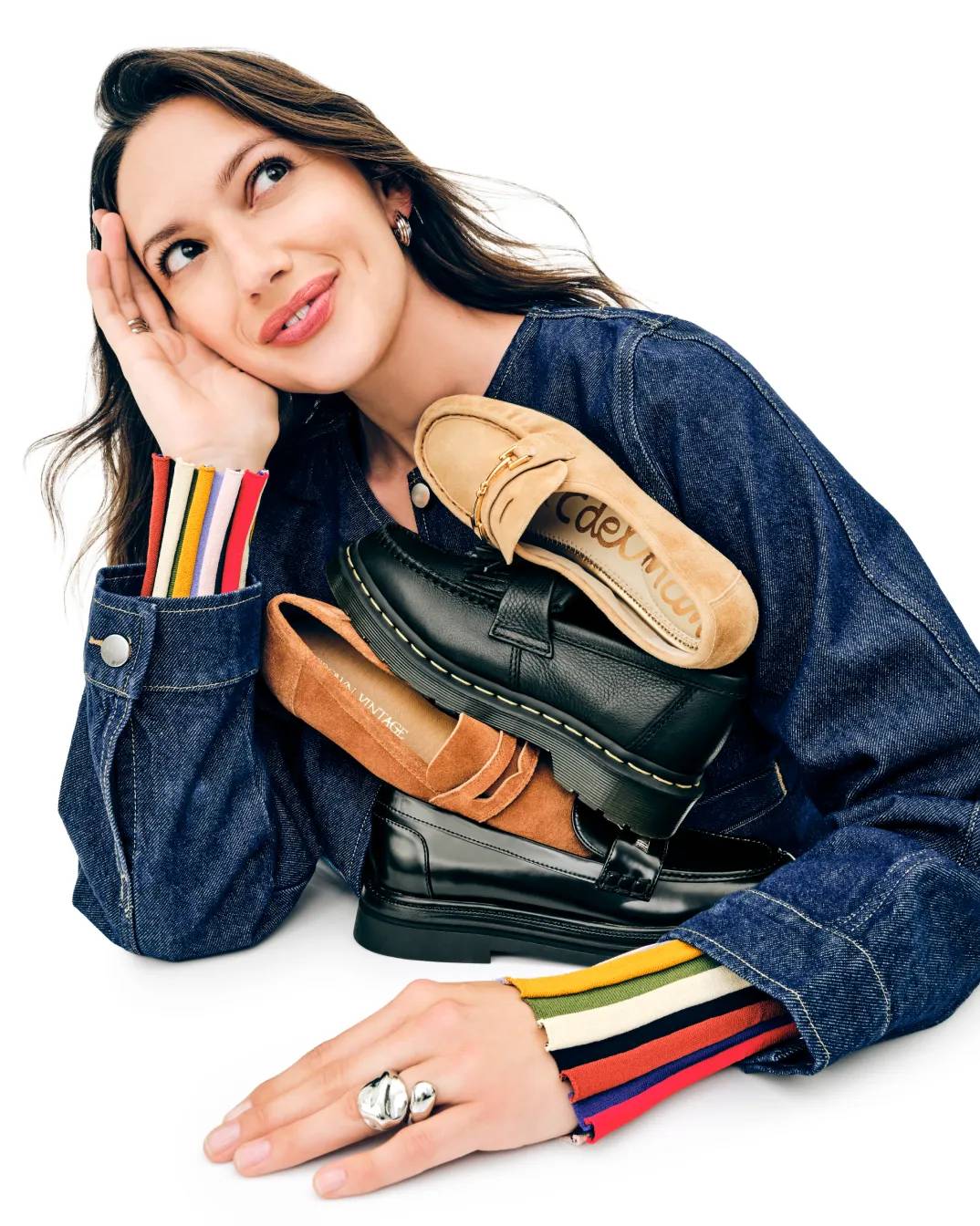 Featuring a model and different colors of loafers.
