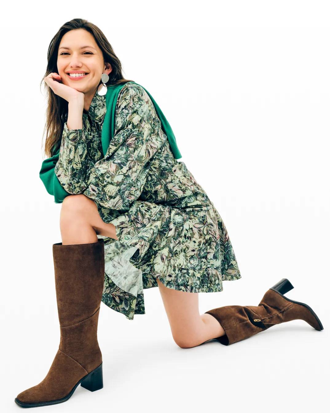 Featuring a model wearing tall boots