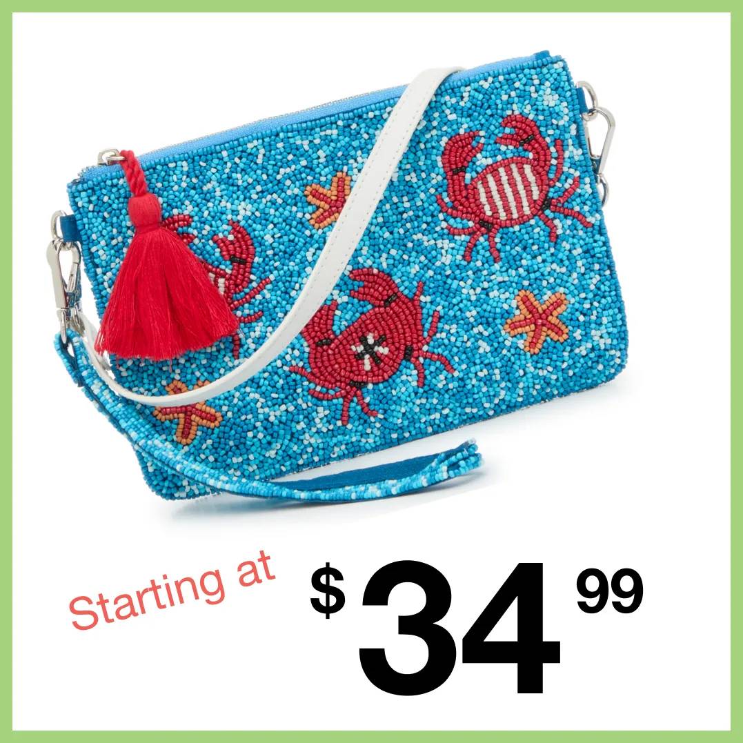 Featuring a blue and red handbag embellished with beaded crabs.