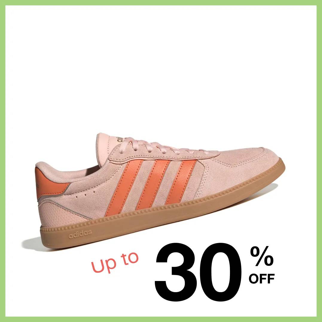 Featuring a women's orange court sneaker from adidas.