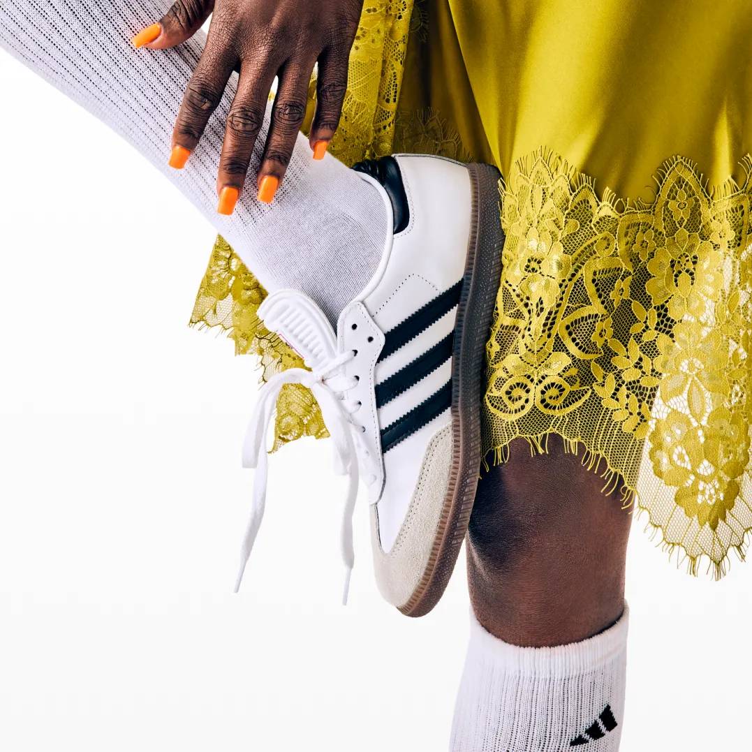 model wearing the Adidas samba indoor. Click to read all about what makes the samba special.