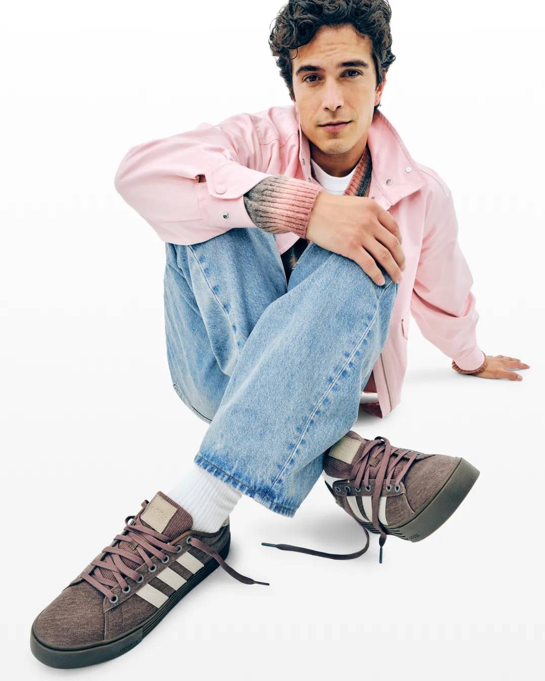 Featuring a model in Nike walking shoes.