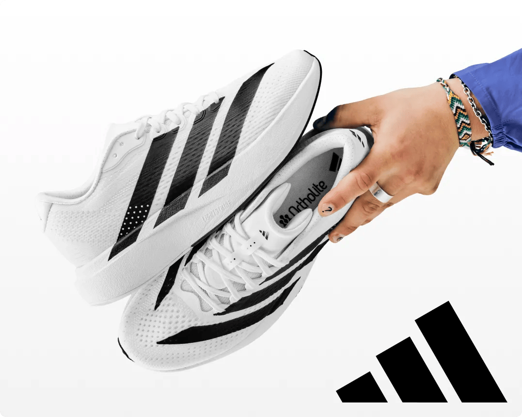 Featuring a paif of adidas sneakers.