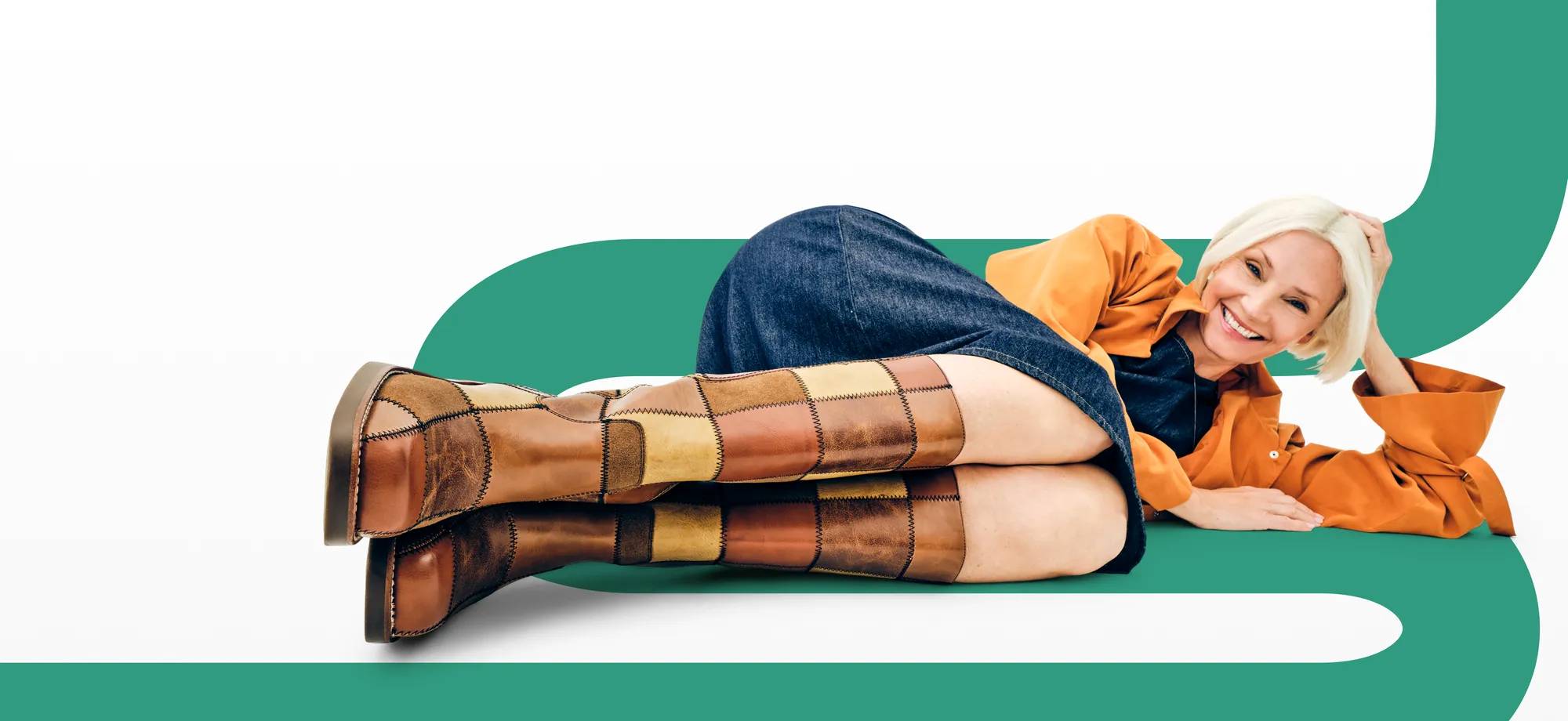 Featuring a woman laying down wearing patchwork Frye & Co. boots.