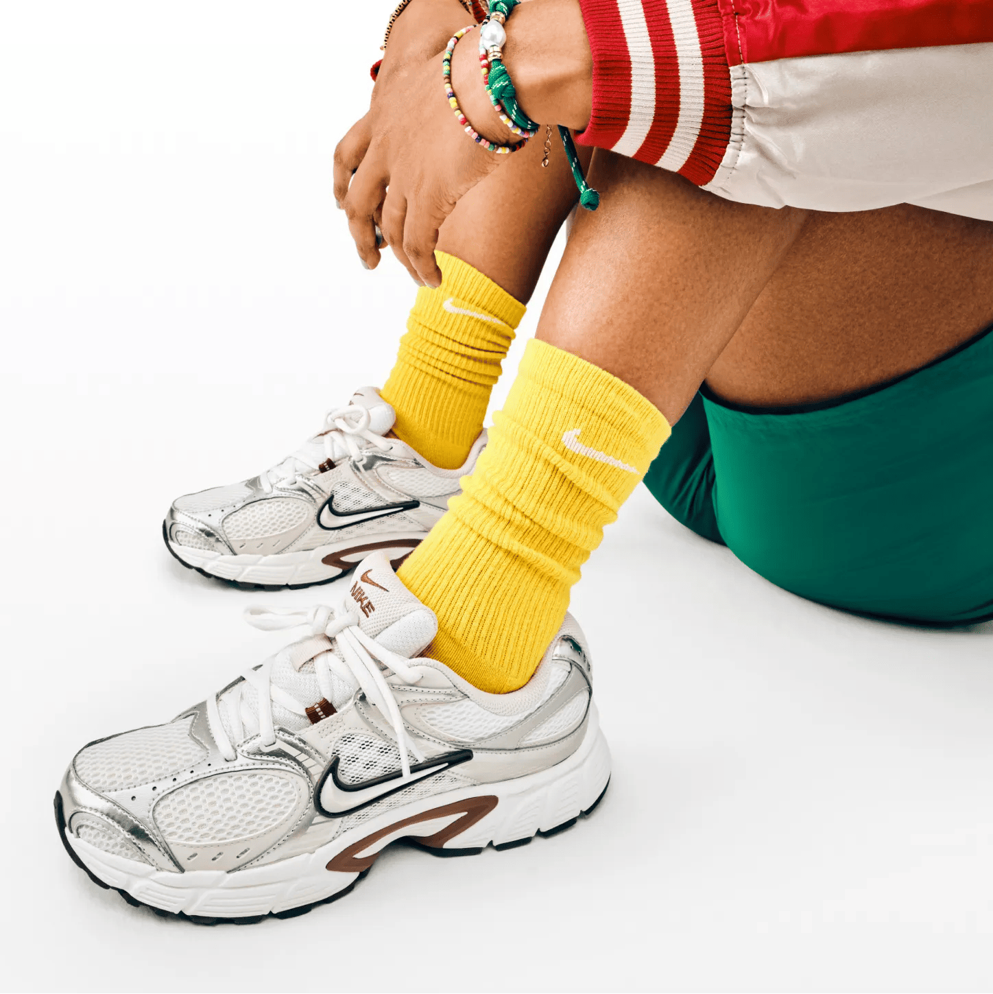 Featuring a model in Nike walking shoes.