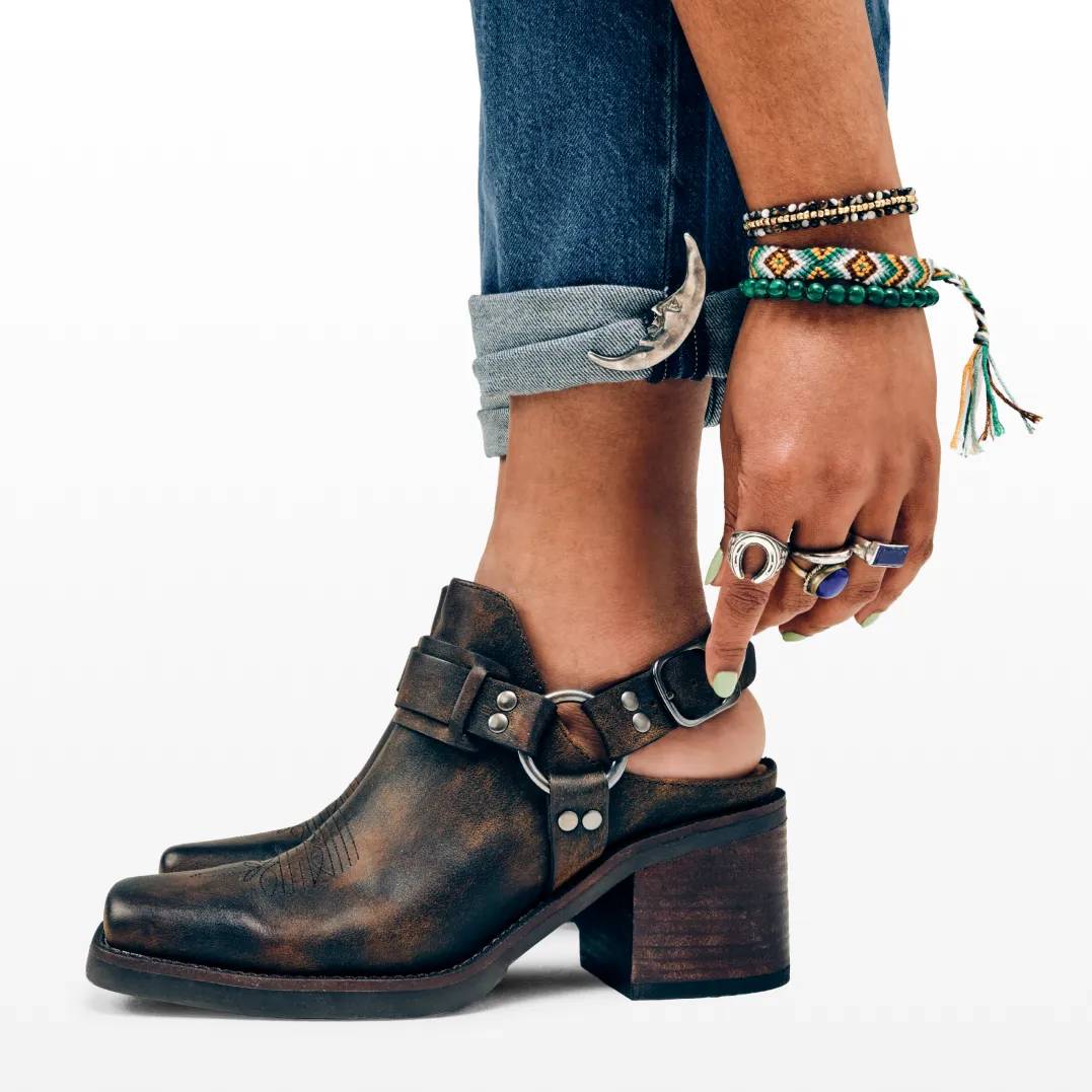 Featuring a model in a men's dress shoe