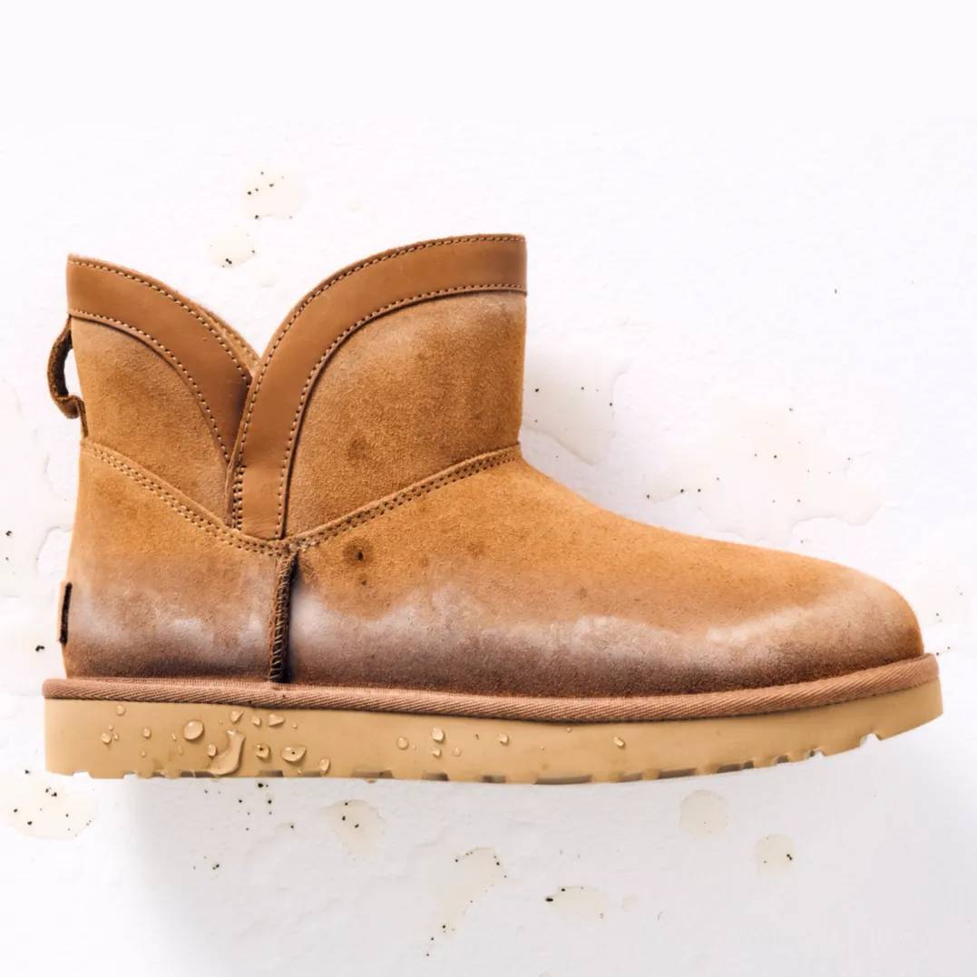 Featuring a model with a bordeaux suede boot