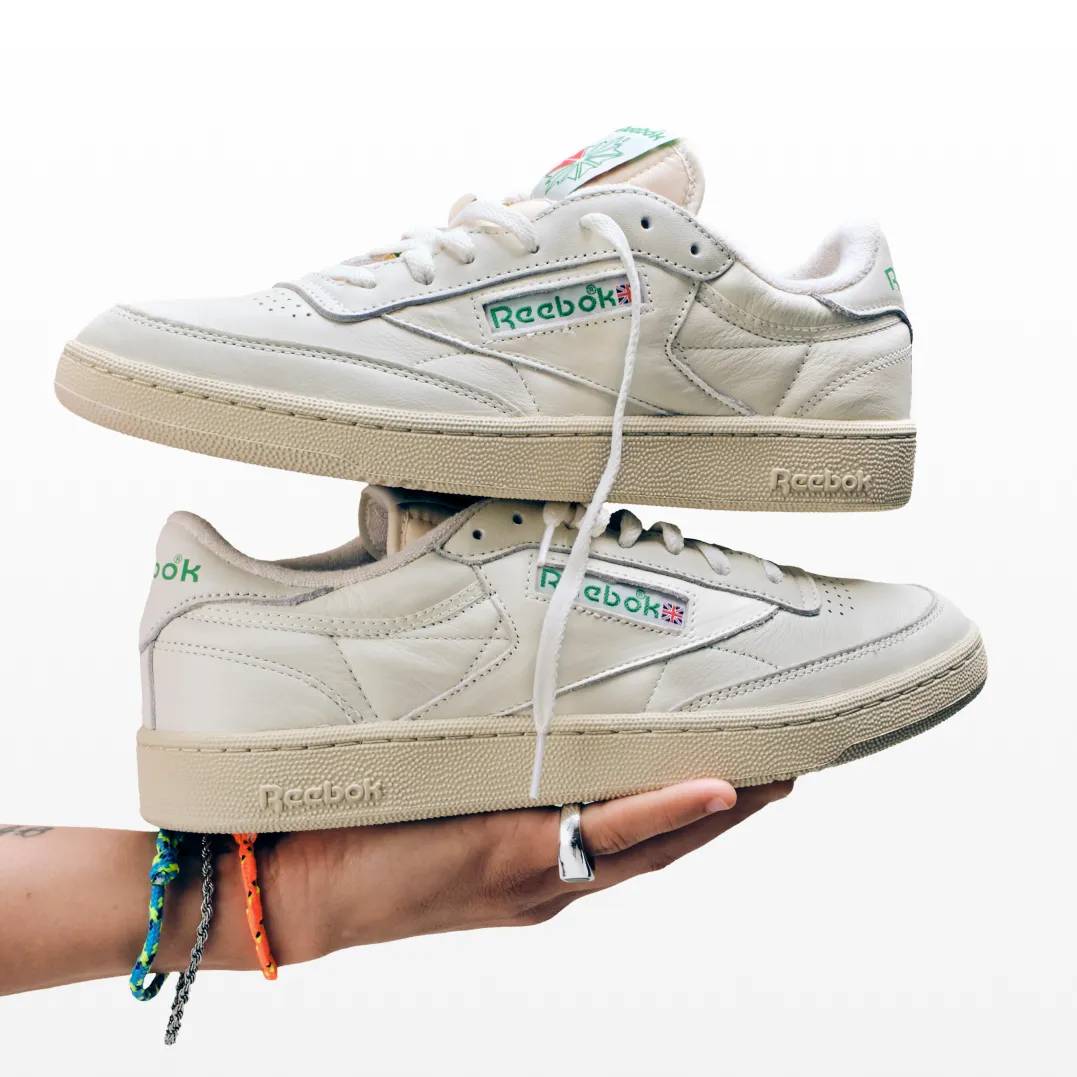 Featuring a pair of Nike kids sneakers