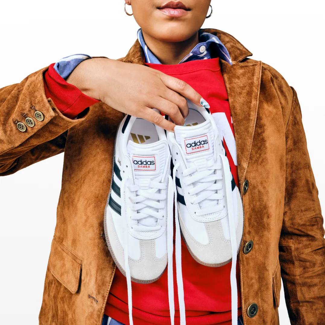 Featuring green and white Nike sneakers